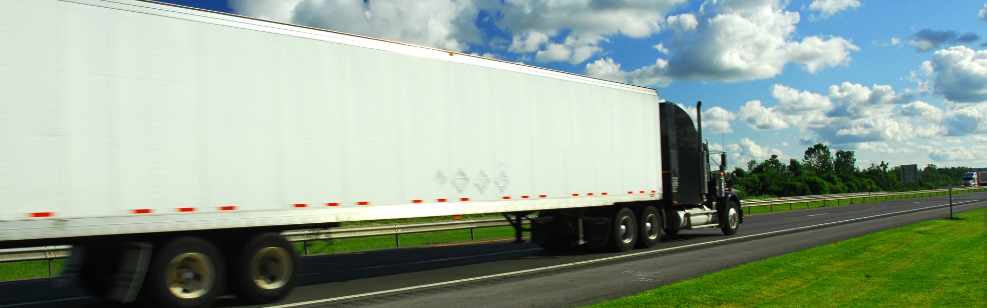 bigstock-Fast-Moving-Truck-664261-1920x600